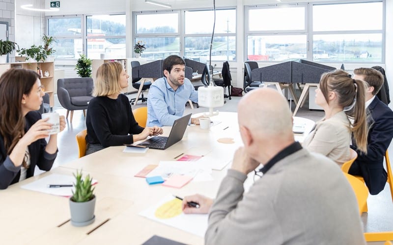 Business people at the Switzerland Innovation Park Basel Area site Jura